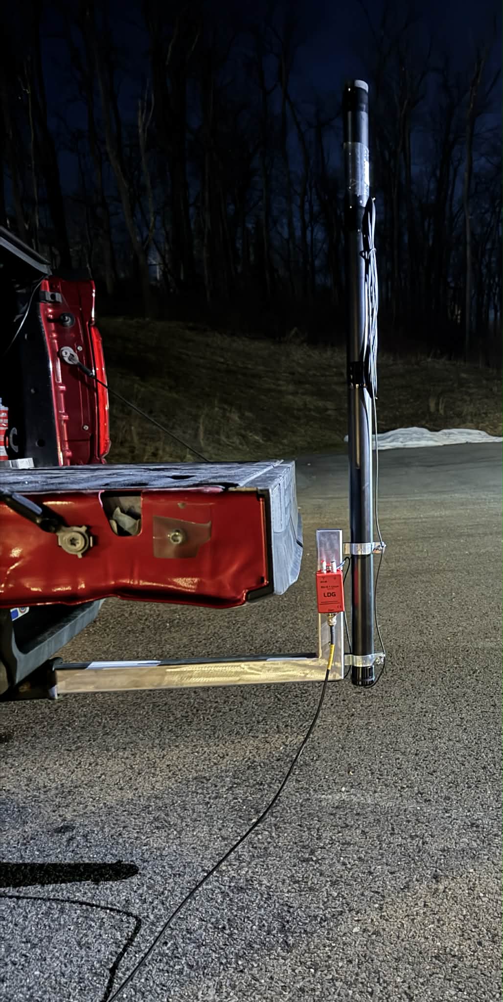 Extended hitch tailgate